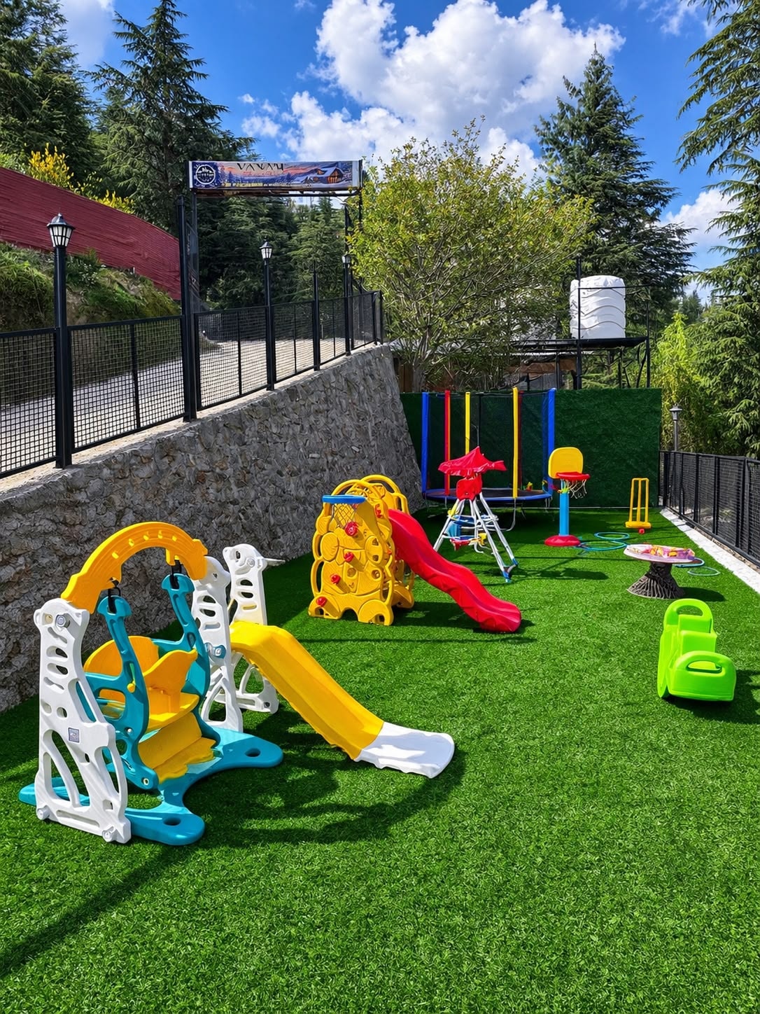 Children playing at the outdoor play area at Vanam