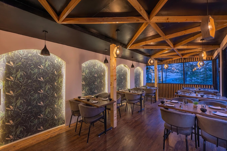 Warm, cosy dining room at Vanam's in-house restaurant